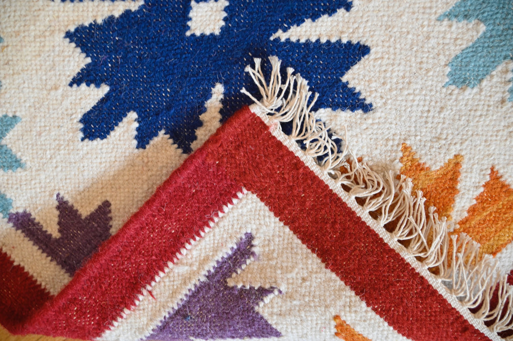 Rainbow Starburst Kilim | 5' x 8'1" | c. 1960–1970