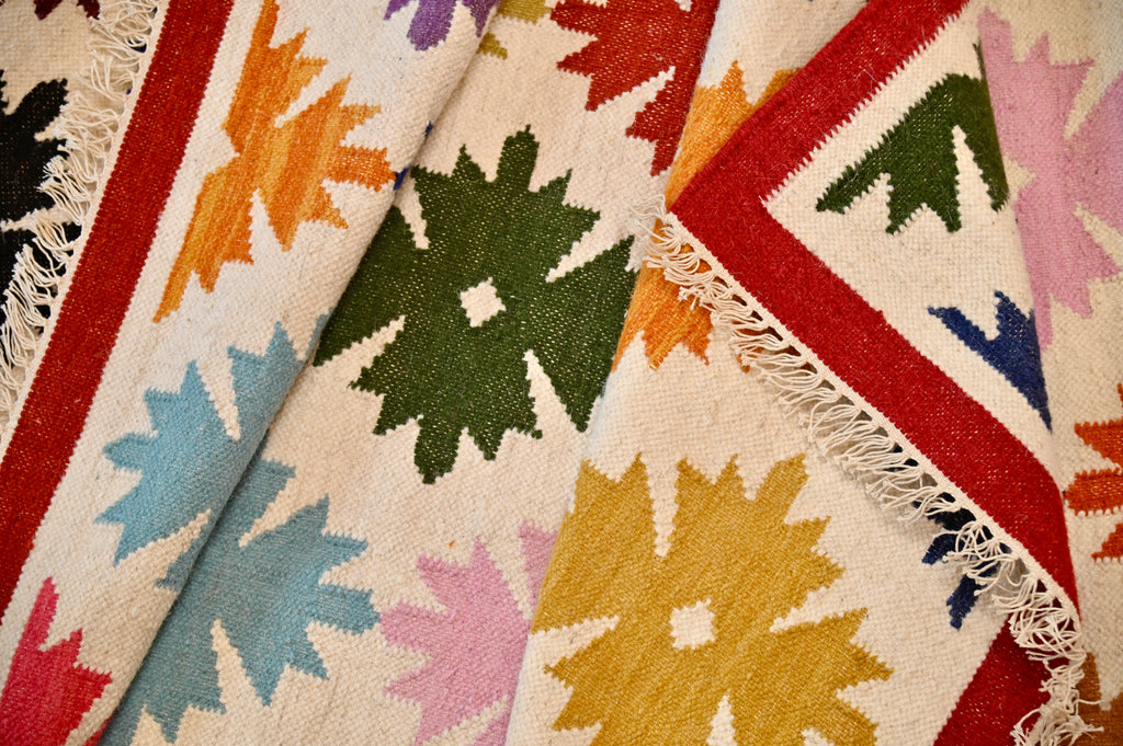 Rainbow Starburst Kilim | 5' x 8'1" | c. 1960–1970