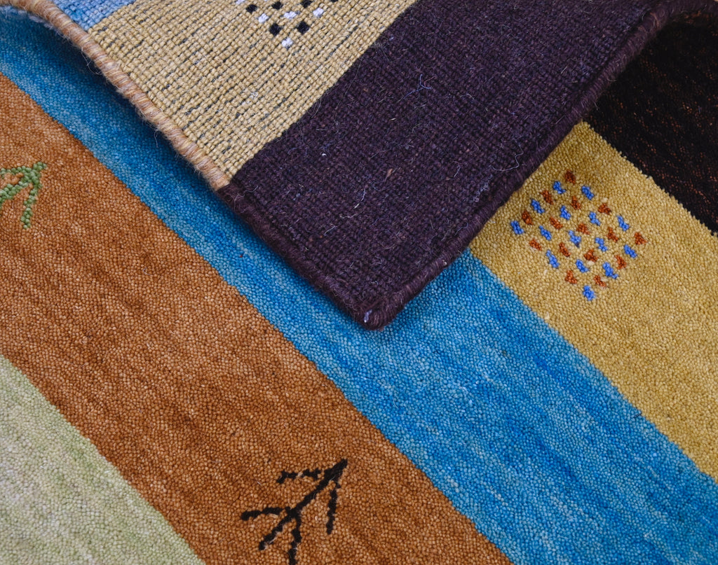Striped Gabbeh Rug with Tribal Motifs | 4'1" x 5'10" | c. 1990s