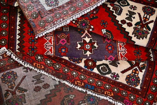 Qashqai Tribal Rug with Ivory Spandrels | 3'1" x 4'10" | c. 1940s–1950s