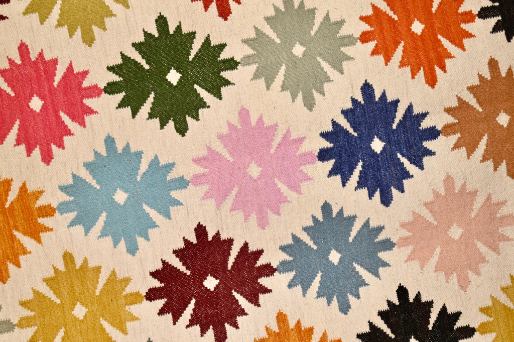 Rainbow Starburst Kilim | 5' x 8'1" | c. 1960–1970